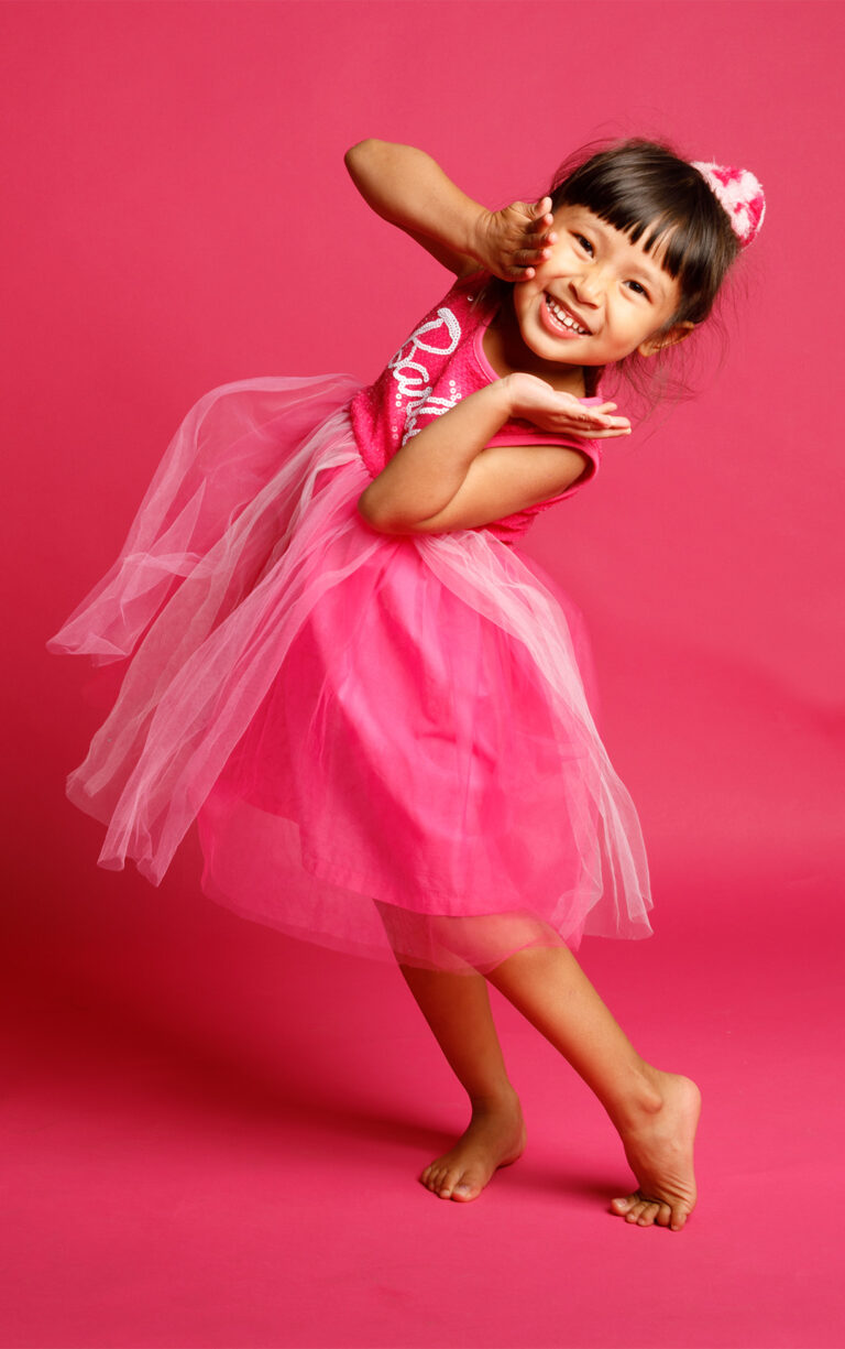 POP-photography-kid-wearing-pink-dress-768x1225